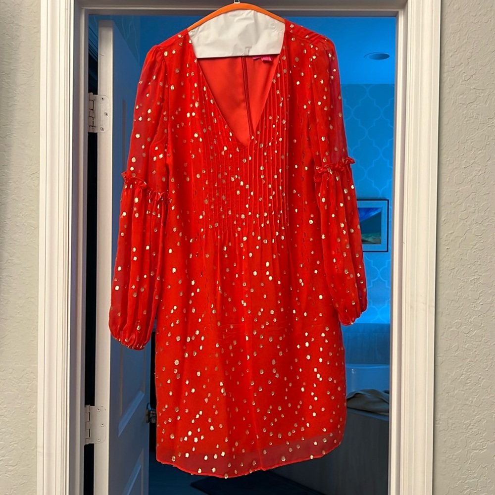 Only worn once. Perfect for the holiday season. Can add a little belt if wanted.